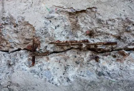 How does concrete corrosion happen?