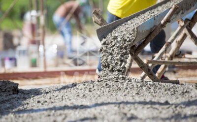 What is the difference between pouring concrete in winter and in summer?